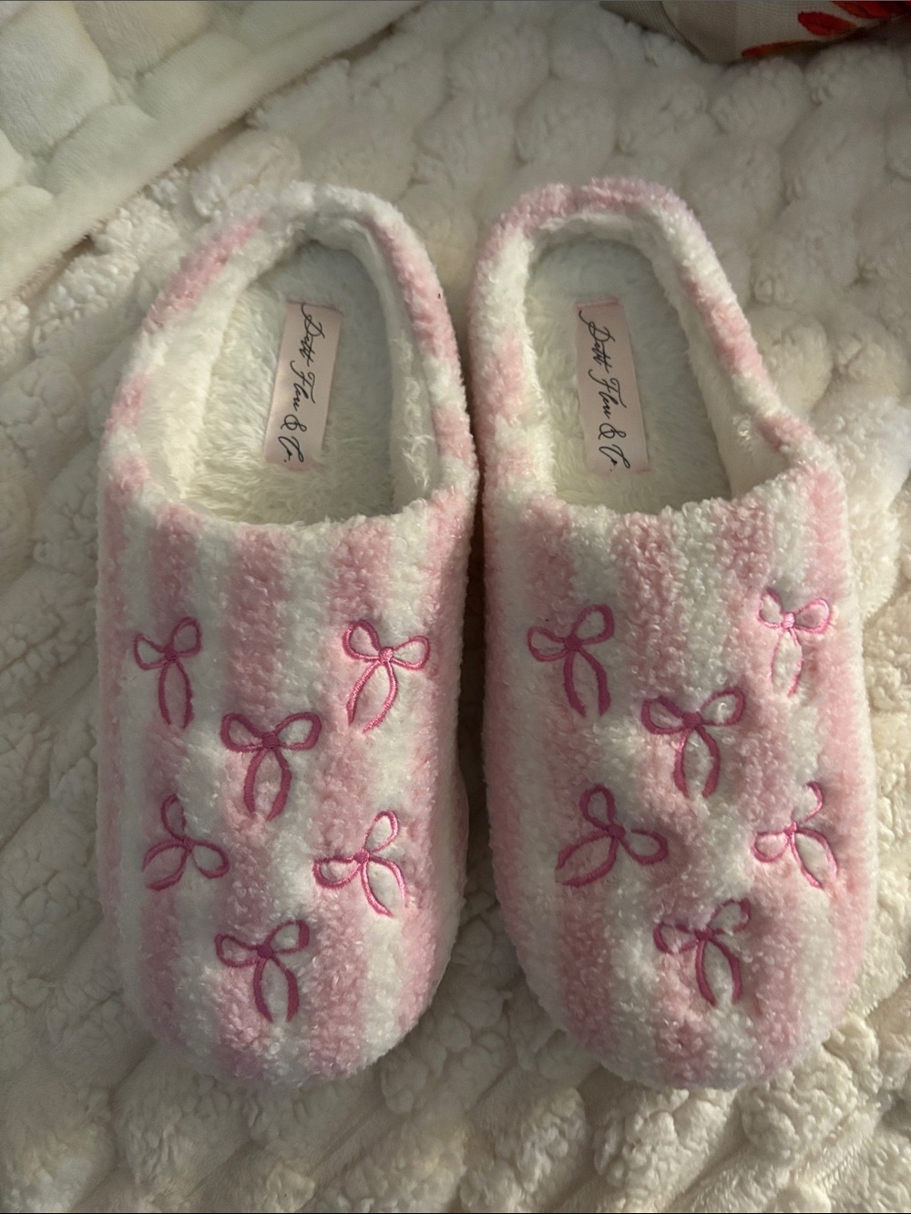 Pink & White Striped Bowtie Slippers Like New. Never worn.